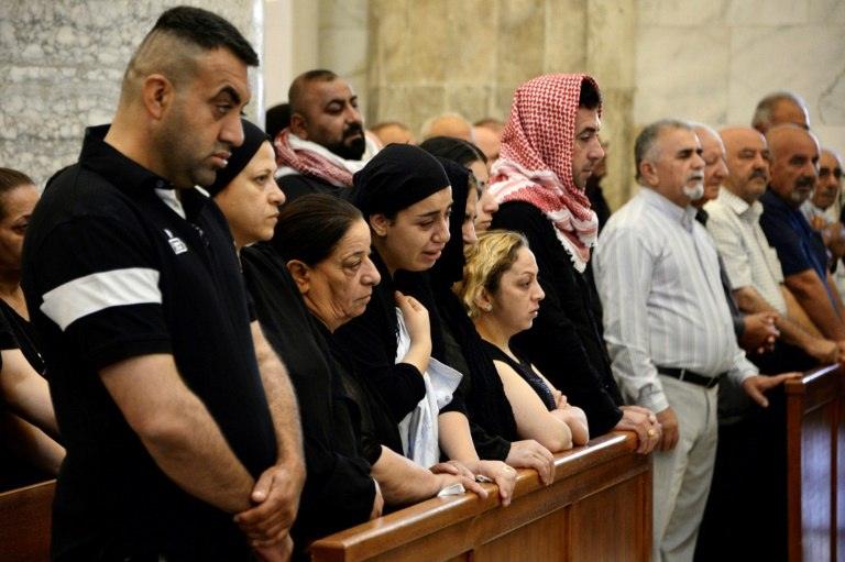 Irak: messe à Qaraqosh pour les victimes de l'incendie lors d'un mariage
