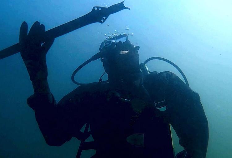 3,000-year-old bronze sword discovered in submerged settlement in Italy