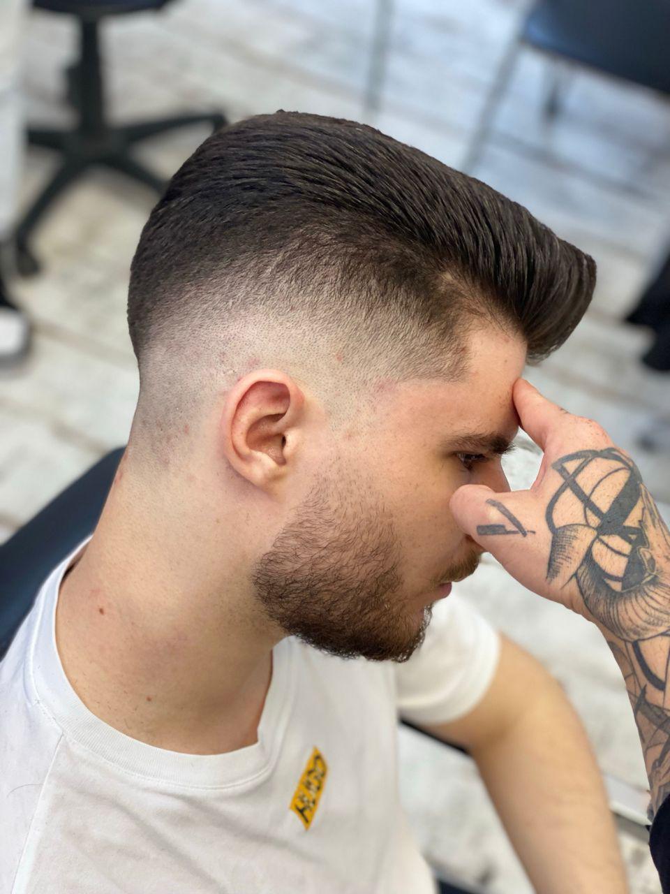 Crew Cut - Minimal styling; a little paste or matte product for texture.