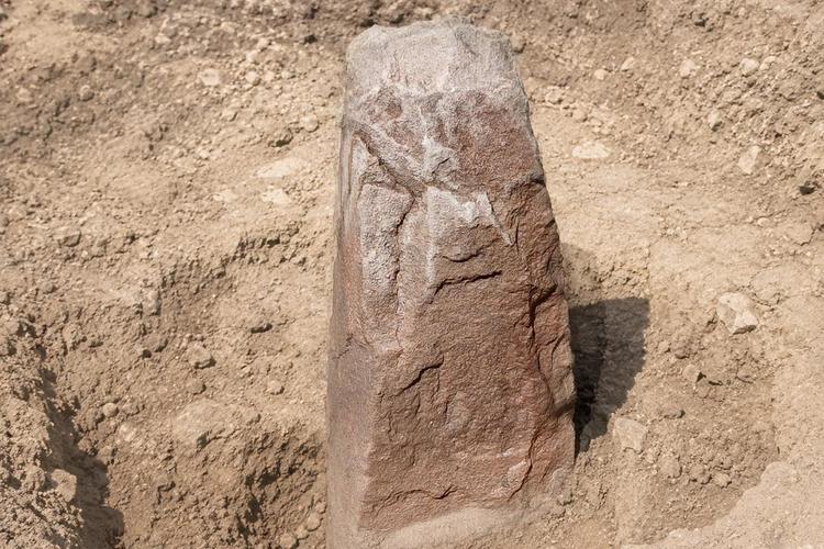Ancient stone with face-like carving discovered in Alderney dig