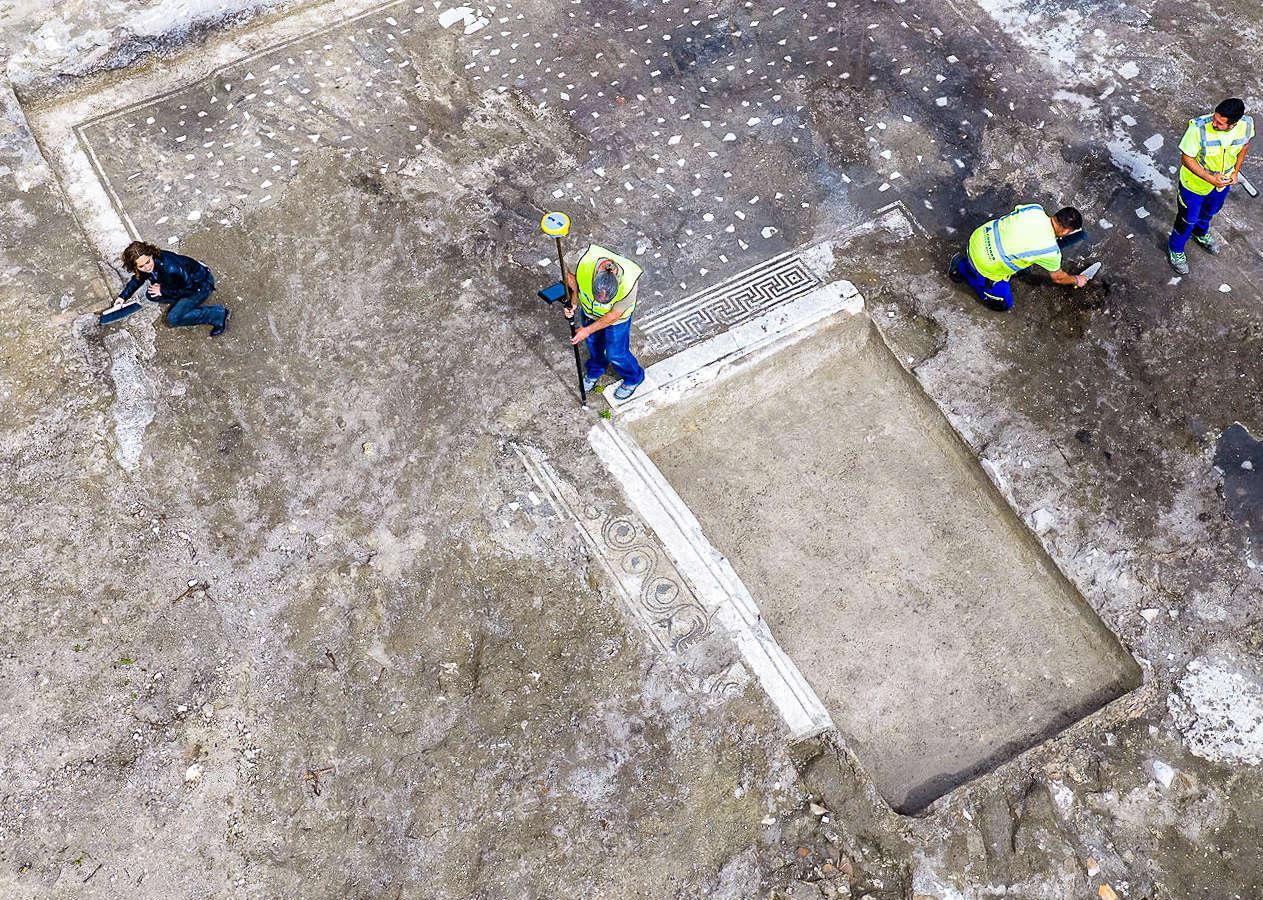 Monumental Roman villa with mosaics and marble statue unearthed after illegal excavation