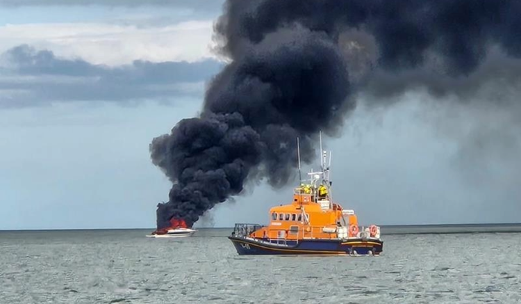 Four people rescued from boat on fire in Dublin Bay