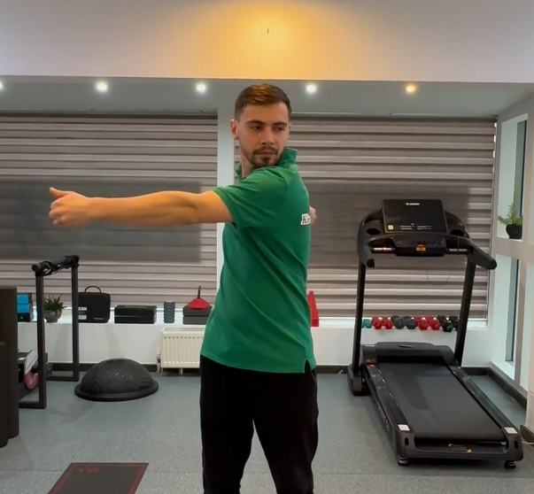 #9 Băț ducem în spate și picior opus (Diagonal stick reach to opposite foot)
