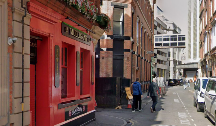 Members of Travelling community protest outside Manchester Irish bar after claims group was refused entry