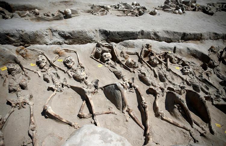 Mystery of Athens’ shackled mass grave deepens