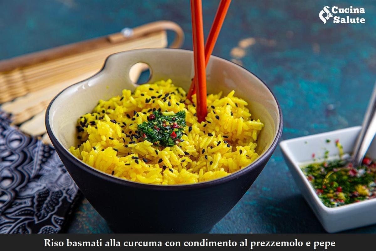 RISO BASMATI ALLA CURCUMA CON CONDIMENTO AL PREZZEMOLO E PEPE...
