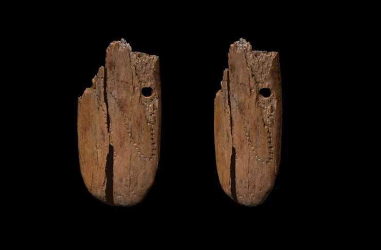 MAMMOTH IVORY PENDANT MAY BE EARLIEST DECORATED JEWELLERY FOUND IN EURASIA MAMMOTH IVORY PENDANT MAY BE EARLIEST DECORATED JEWELLERY FOUND IN EURASIA