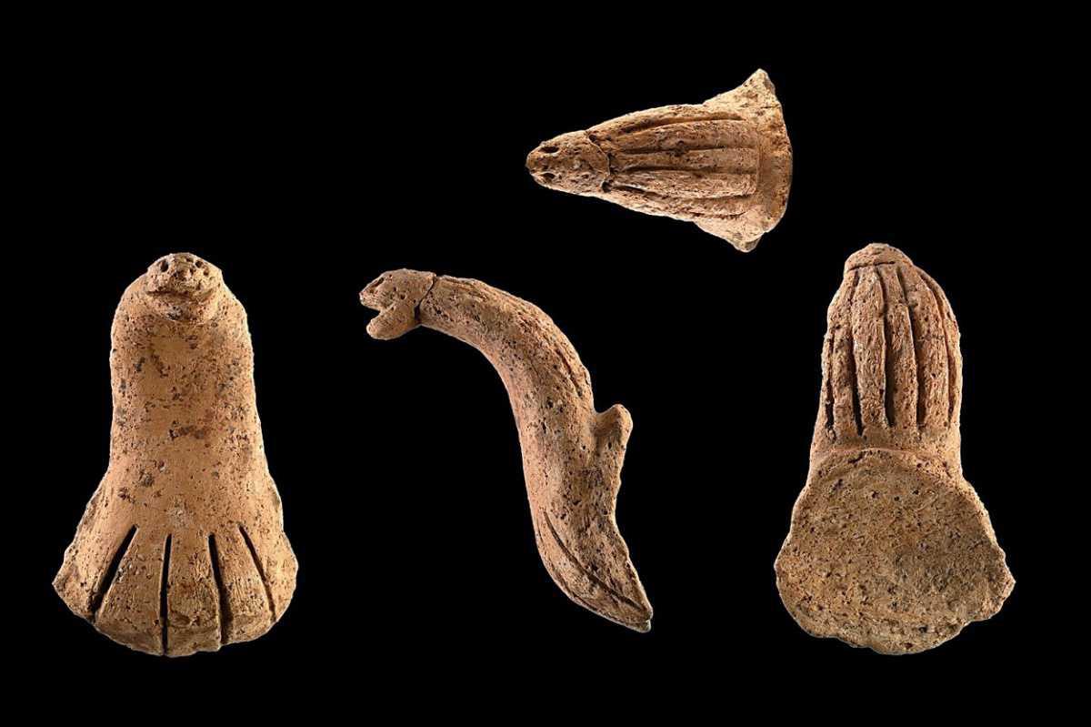 Archaeologists find 4,000-year-old cobra-shaped ceramic handle