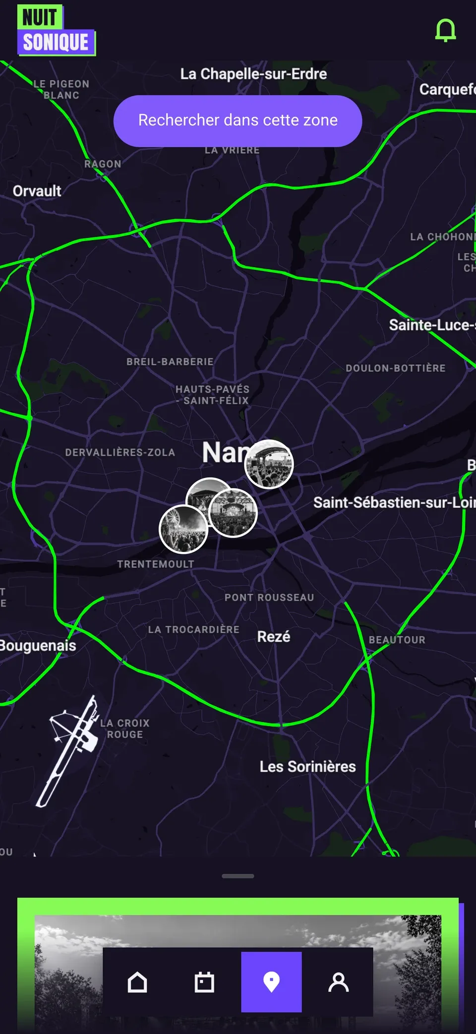 The Nuit Sonique app map with a custom style: night background, purple and neon green roads, no shops shown.