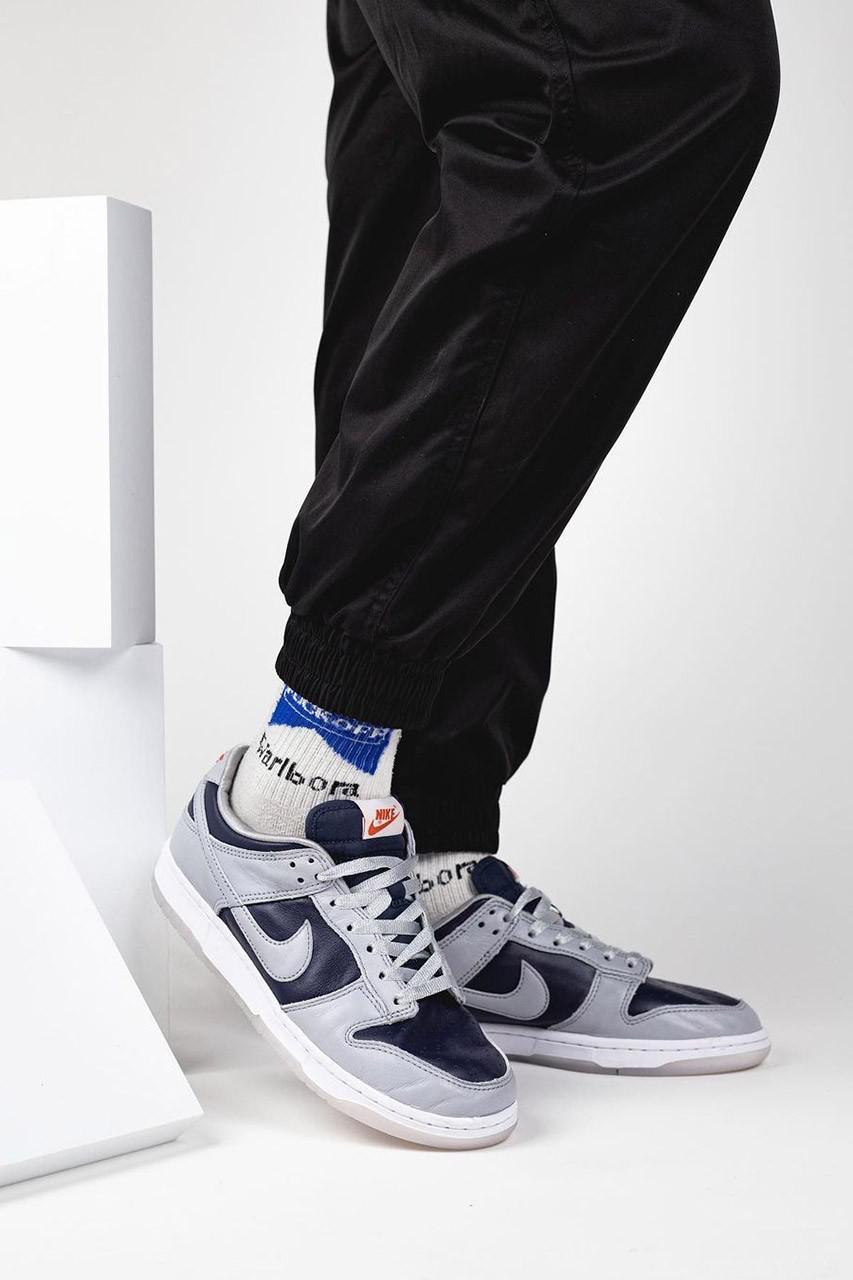 Deux. coloris de Nike Dunk Low 2021 font surface