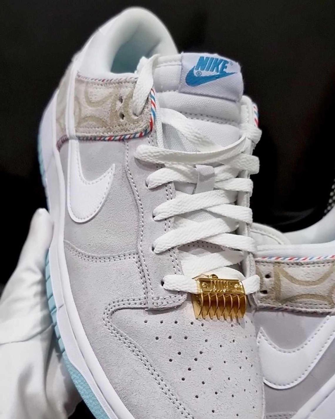 La Nike Dunk Low "Barber Shop" apparaît dans une autre couleur grise. La Nike Dunk Low "Barber Shop" apparaît dans une autre couleur grise.