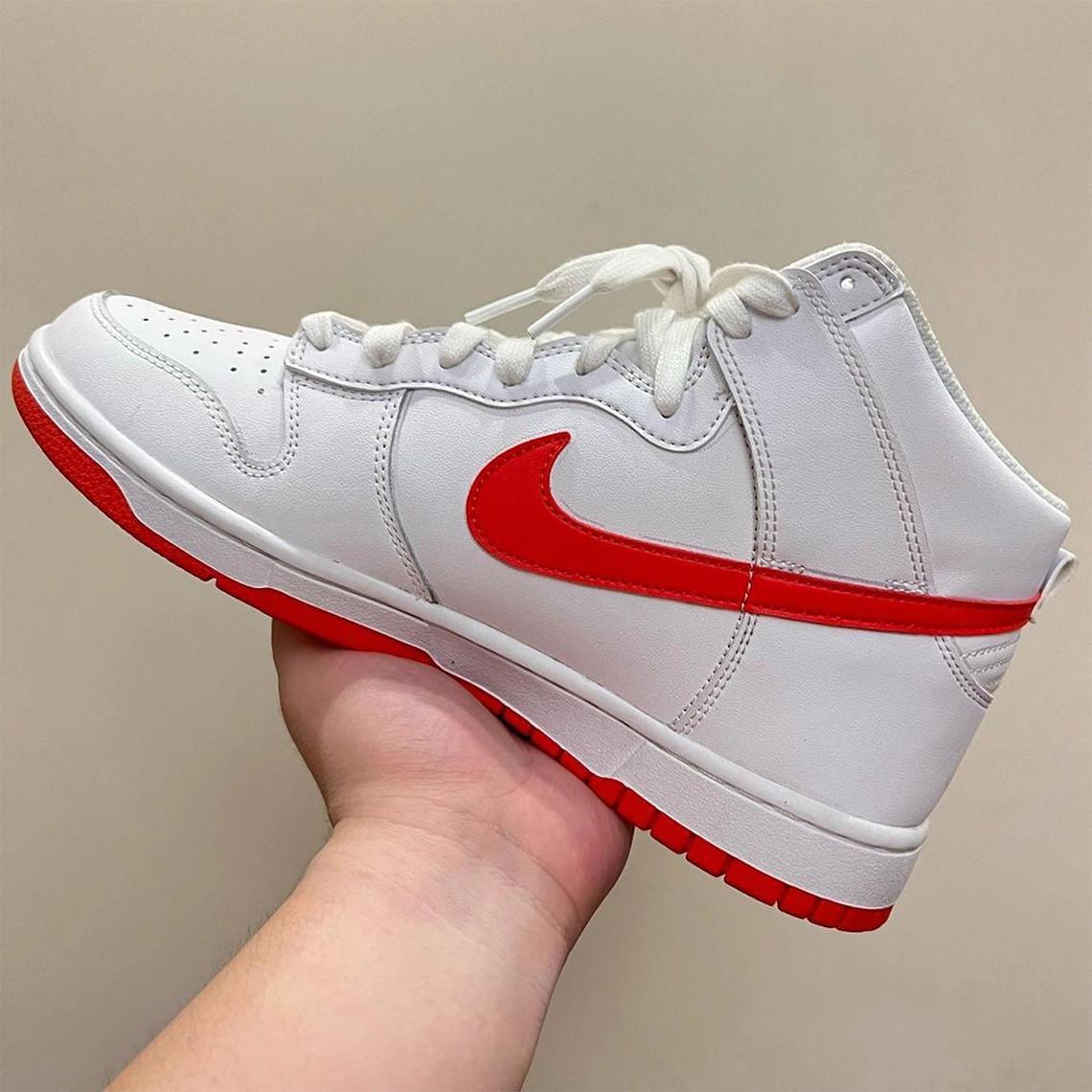 Un échantillon de Nike Dunk High en "blanc/rouge" apparaît avant la sortie de 2023