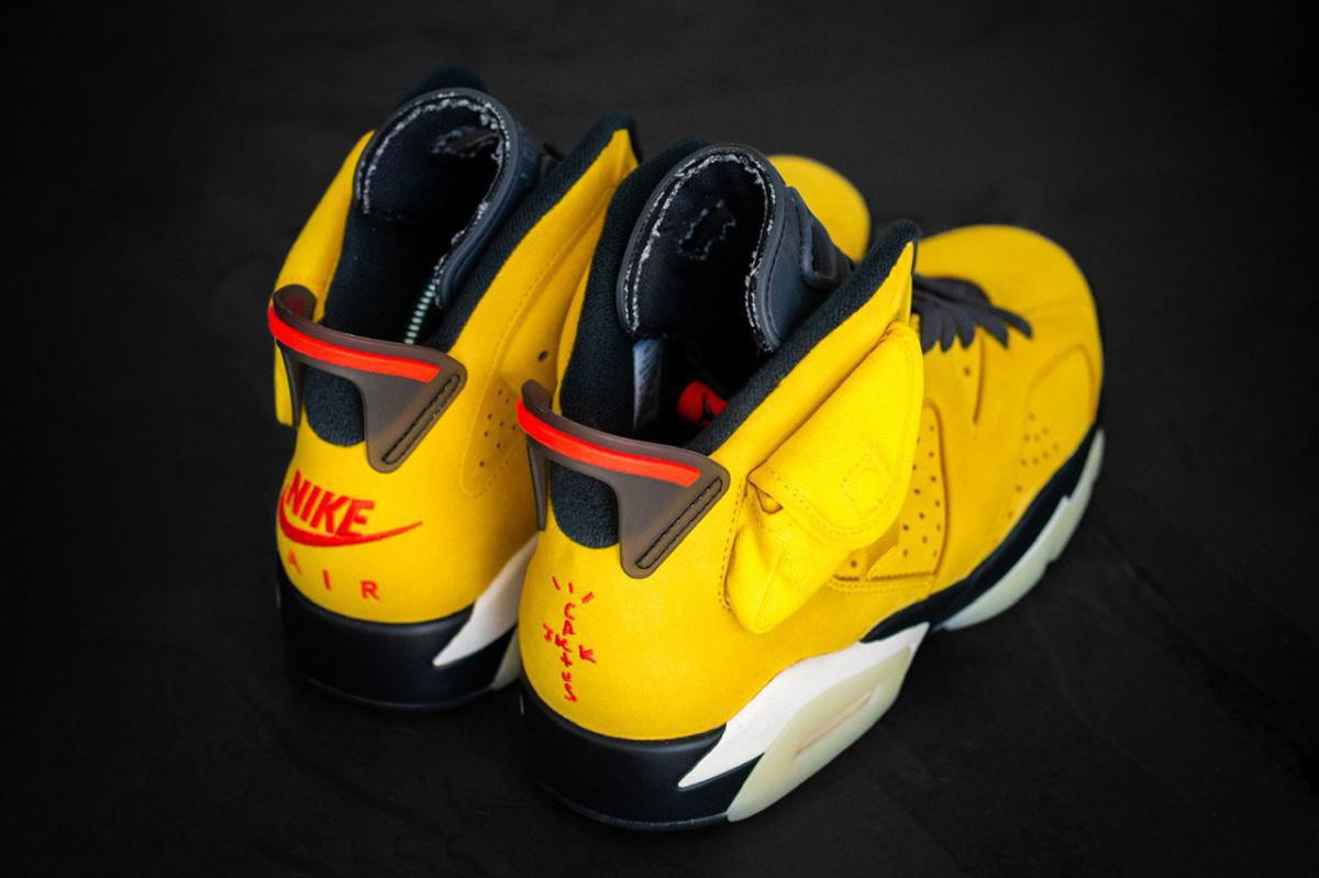Vue détaillée de la Travis Scott x Air Jordan 6 "F&F Yellow". Vue détaillée de la Travis Scott x Air Jordan 6 "F&F Yellow".