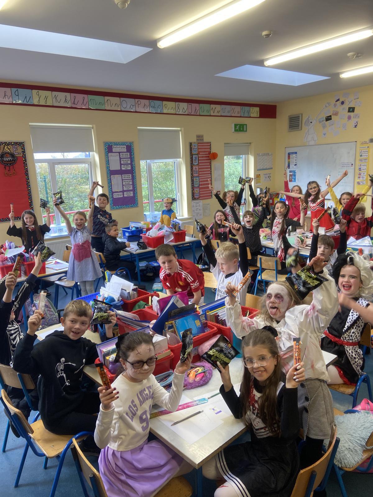 ‘Three witches from the Parents council visited the school this afternoon to wish all the children a happy Halloween and midterm. They also gave every child some spooky treats to enjoy