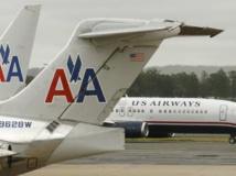 Un avion d'US Airways et un avion de d'American Airlines sur le tarmac de l'aéroport Ronald Reagan dans le Conté d'Arlington, en Virginie. 