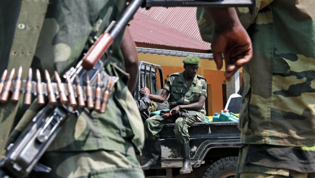 Des soldats du M23 à Bunagana, le 7 avril 2013. AFP PHOTO/ ISAAC KASAMANI