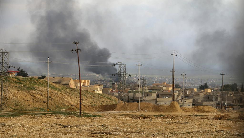 Vue générale de la ville de Sinjar lors d'affrontements le 22 décembre 2014. REUTERS/Stringer