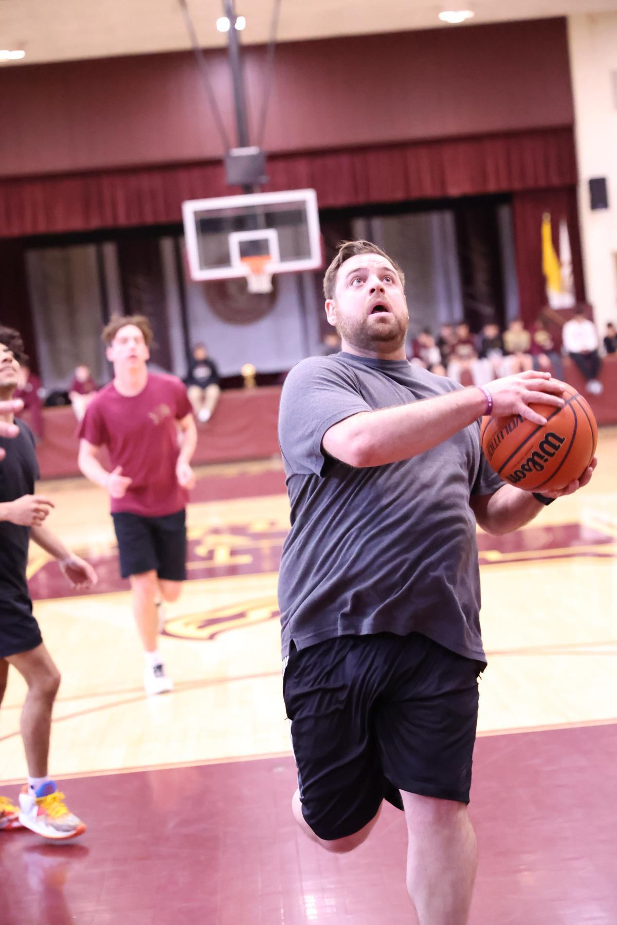 Faculty Down Seniors in Basketball