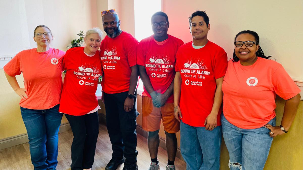 Sound the Alarm | Shipbuilders help with smoke detector installation 