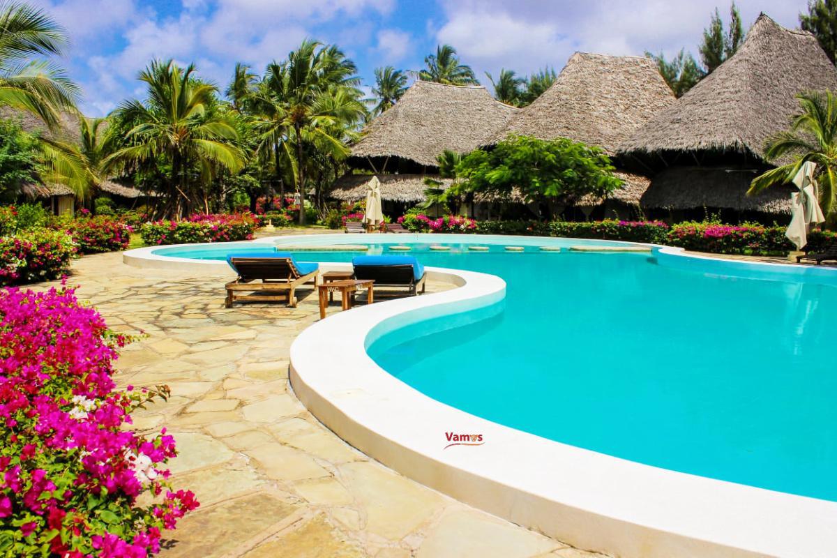 Pristine Beachfront Living: Unwind in 2BR Malindi Cottages from KES 1,999/pp!