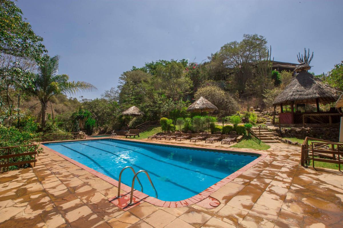 Stay in this Vintage Villa with a pool and park views from 2649 Per Person! 