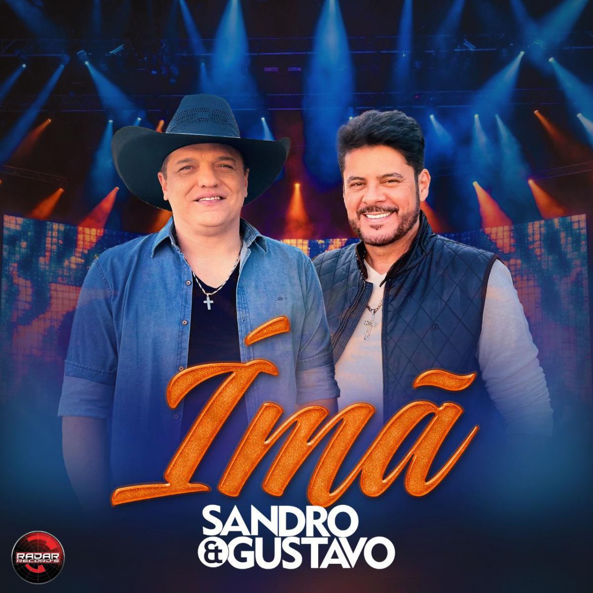 Sandro & Gustavo revivem clássico "Imã" com nova formação e clipe inédito Sandro & Gustavo revivem clássico "Imã" com nova formação e clipe inédito