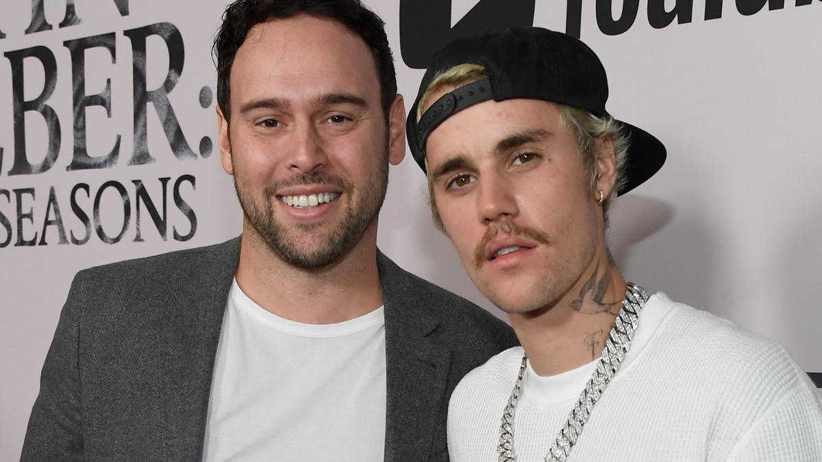Justin Bieber é acusado de dever milhões ao ex-empresário Scooter Braun Justin Bieber é acusado de dever milhões ao ex-empresário Scooter Braun