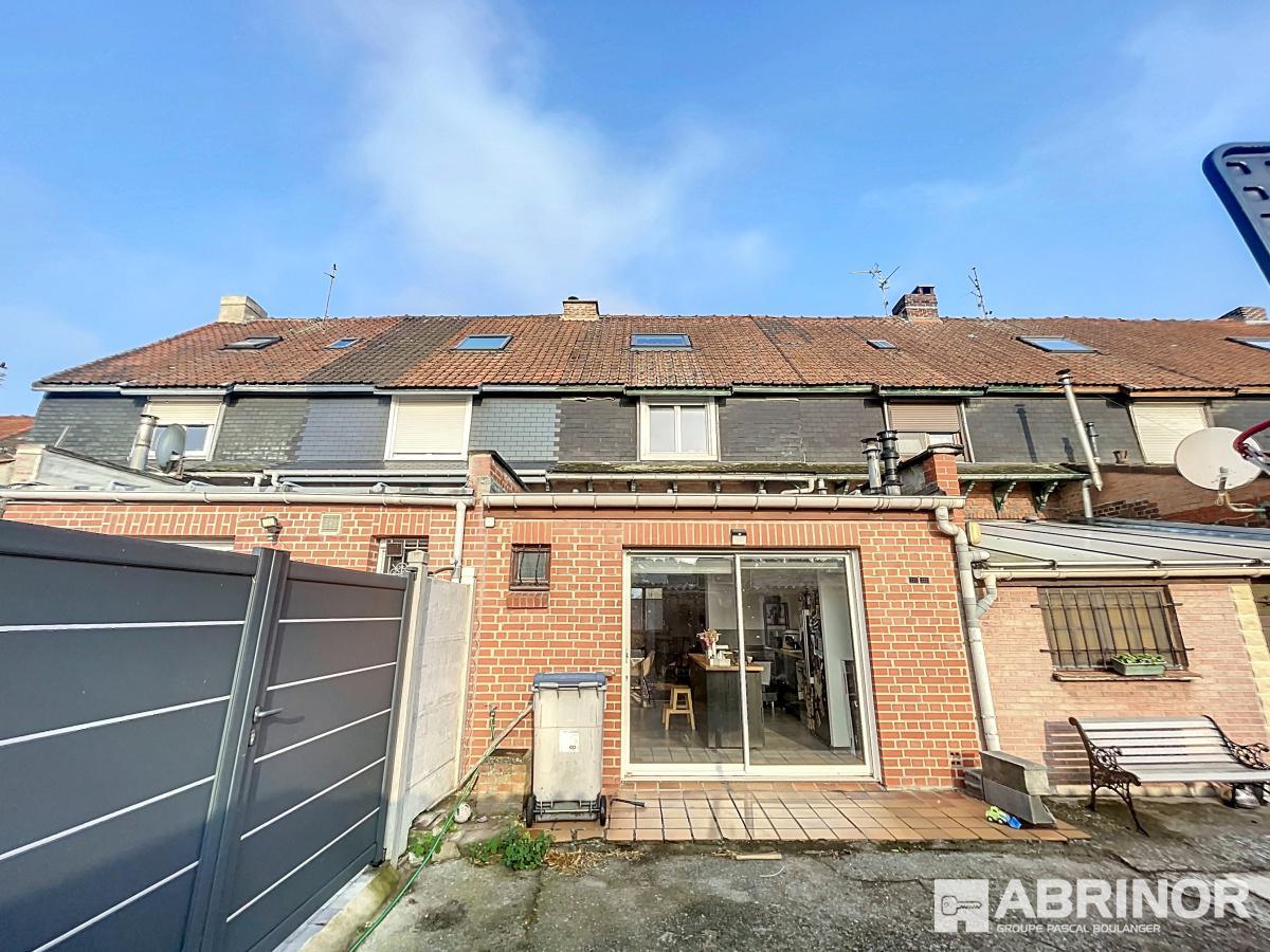 S-flamande de 87.6 m² hab. - 3 chambres - Garage et jardin.