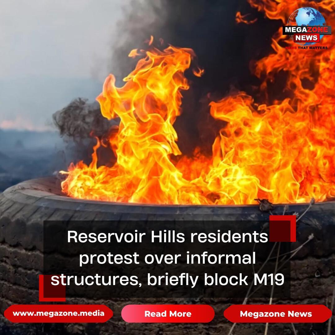 Reservoir Hills residents protest over informal structures, briefly block M19 Reservoir Hills residents protest over informal structures, briefly block M19
