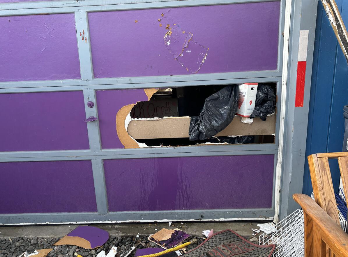 WPD officers arrest woman damaging garage with axe WPD officers arrest woman damaging garage with axe