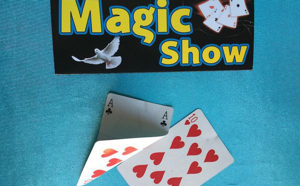 The card traveling under the table