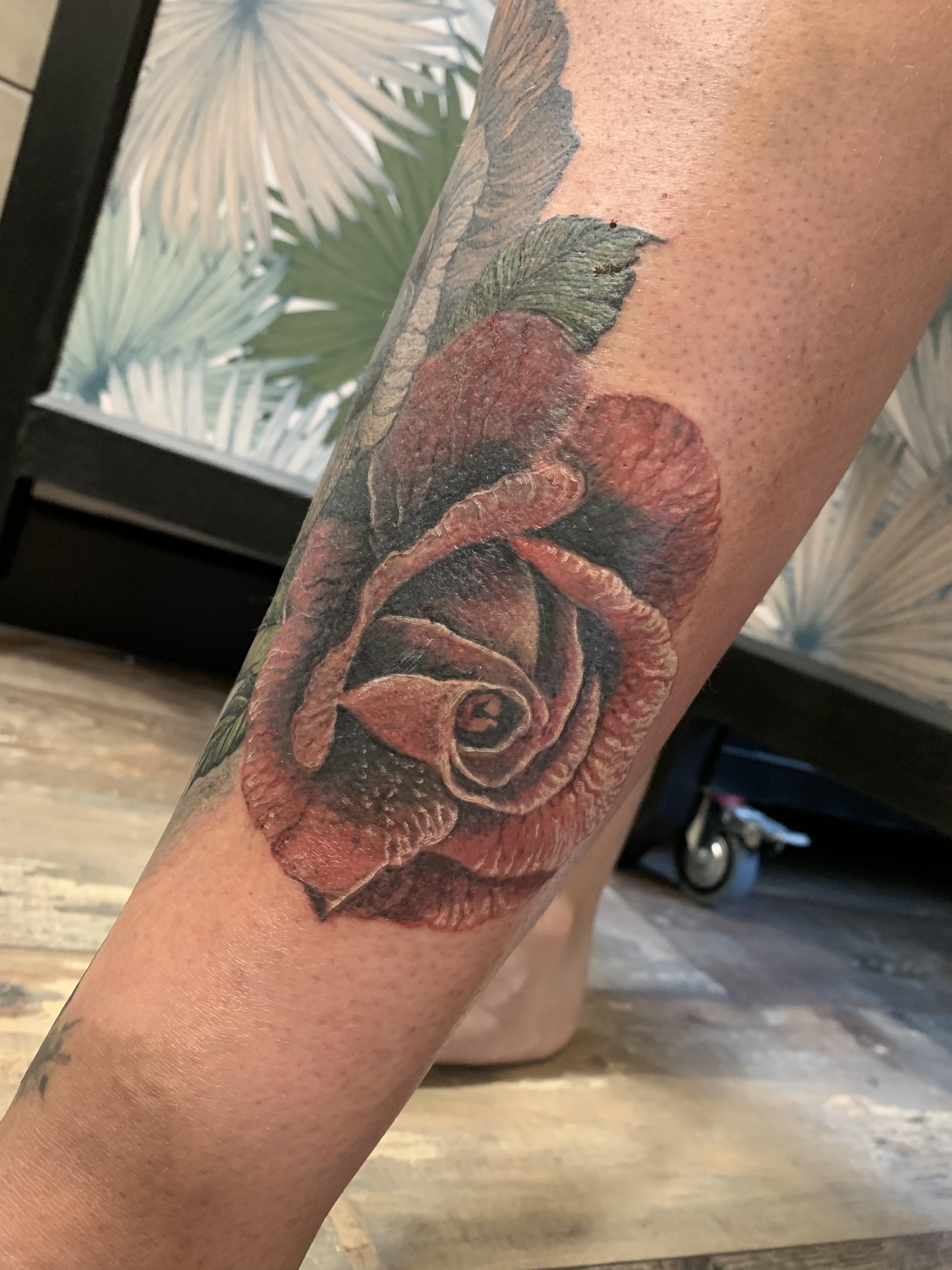 Tatouage rose Tattoo cover recouvrement 