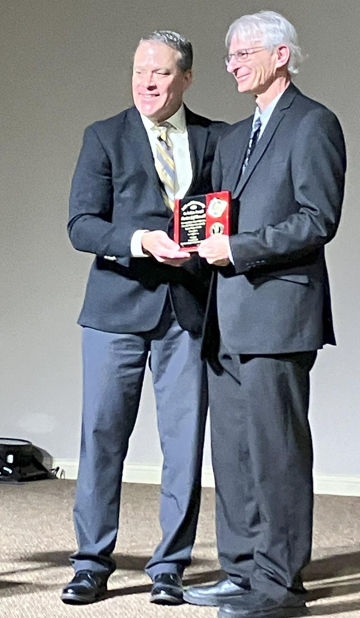 Russell receives Faith in Action award at prayer breakfast Russell receives Faith in Action award at prayer breakfast
