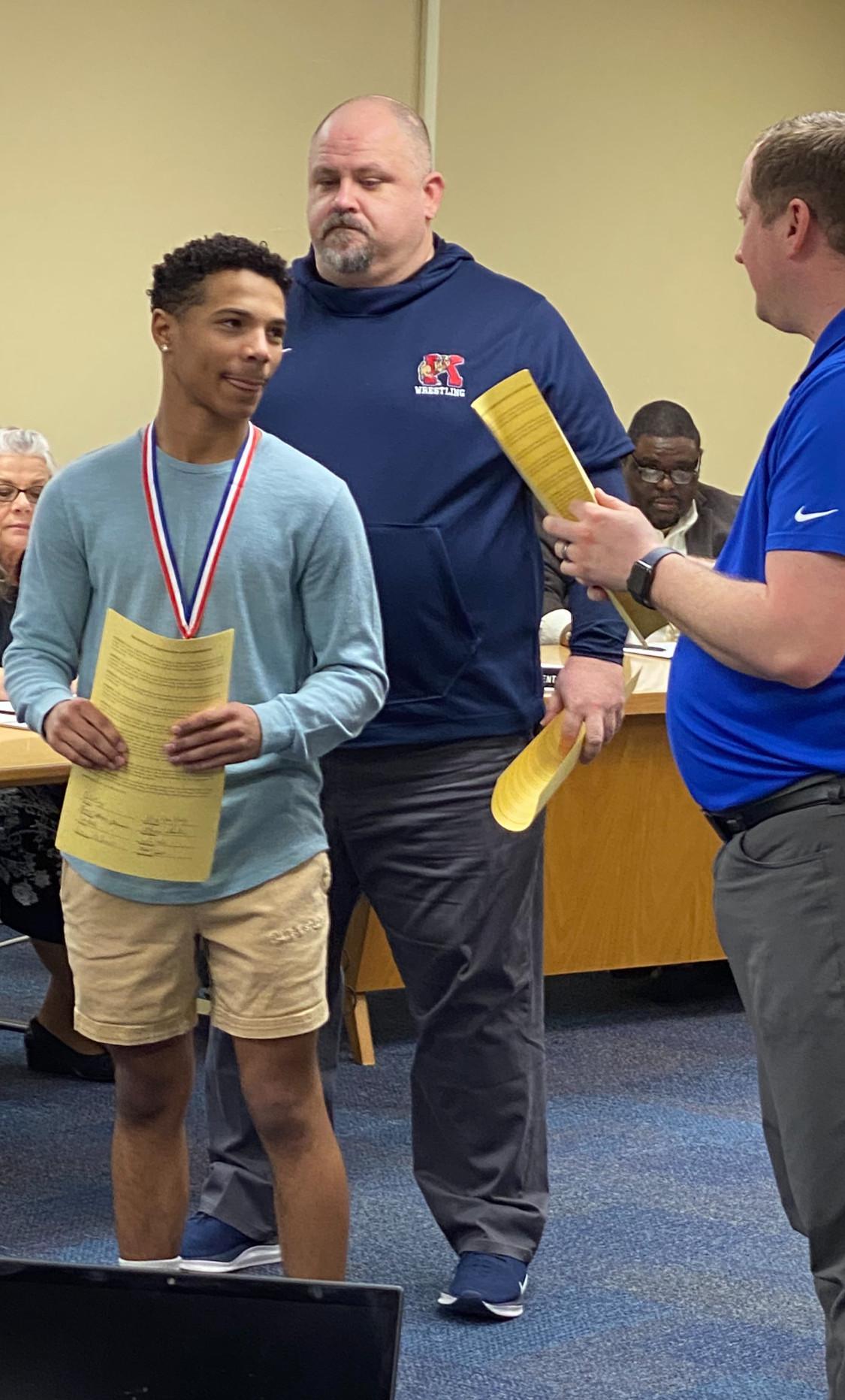 School board honors student athletes