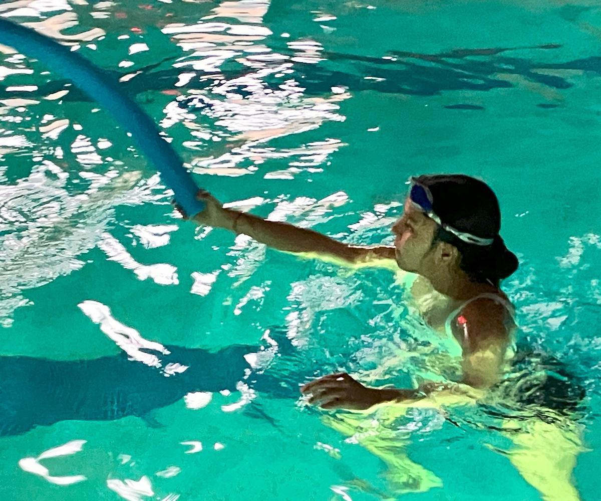 Glo Swim fills YMCA pool