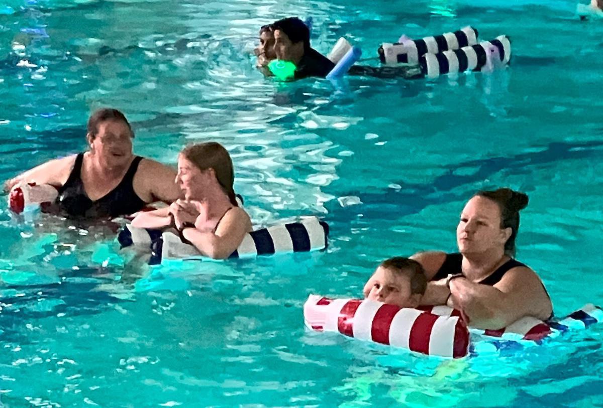 Glo Swim fills YMCA pool