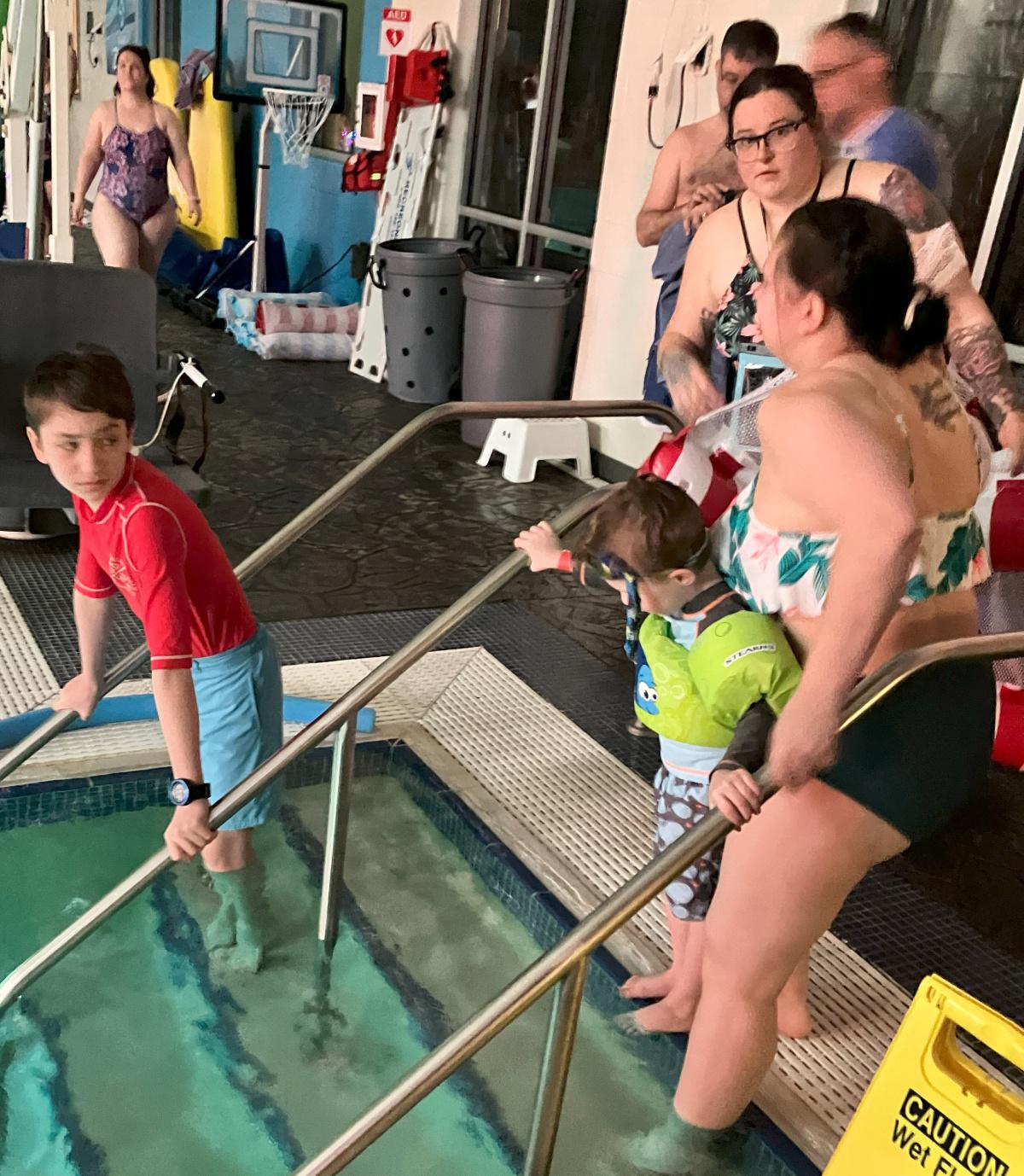 Glo Swim fills YMCA pool