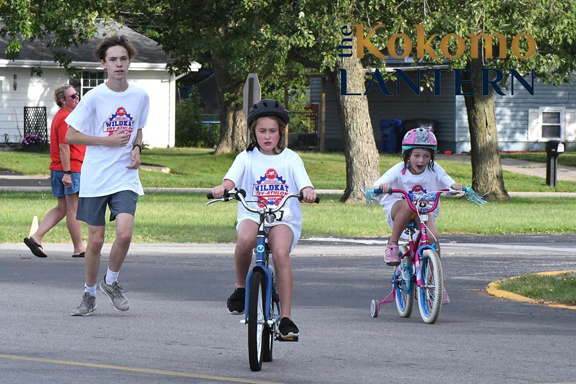 Kids scamper through Pools, Pedals, and Paws