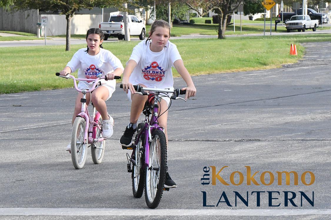 Kids scamper through Pools, Pedals, and Paws