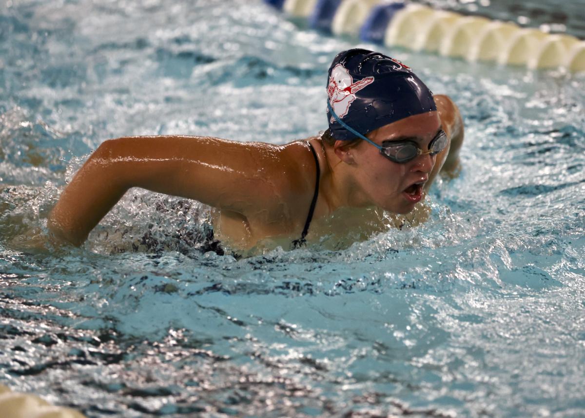 Lady Panthers swim to a win