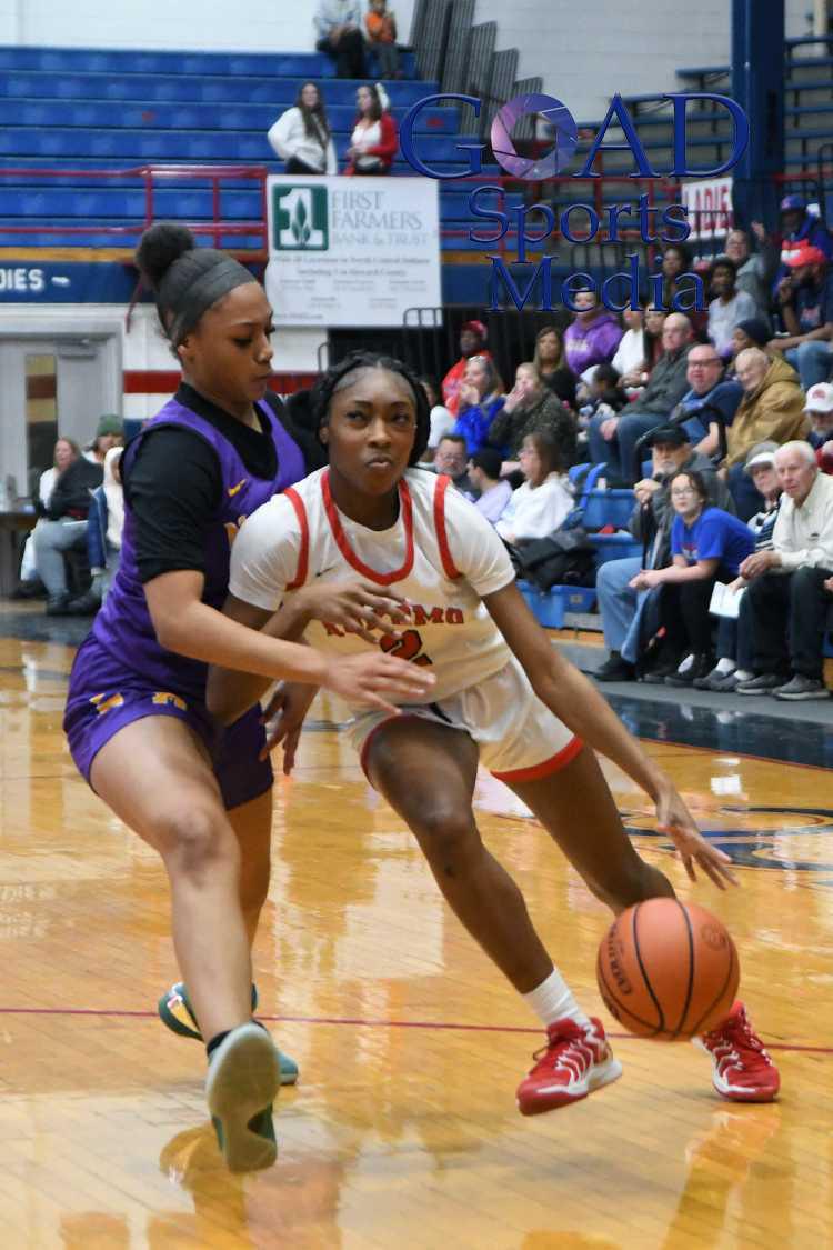 Lady Kats handle Marion at home