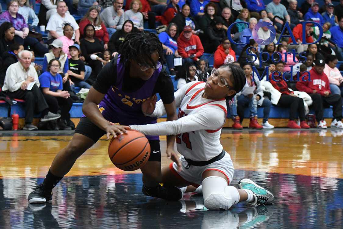 Lady Kats handle Marion at home