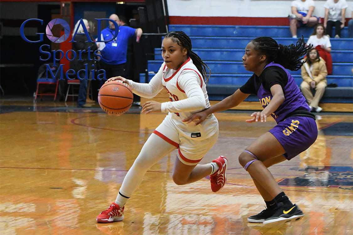 Lady Kats handle Marion at home