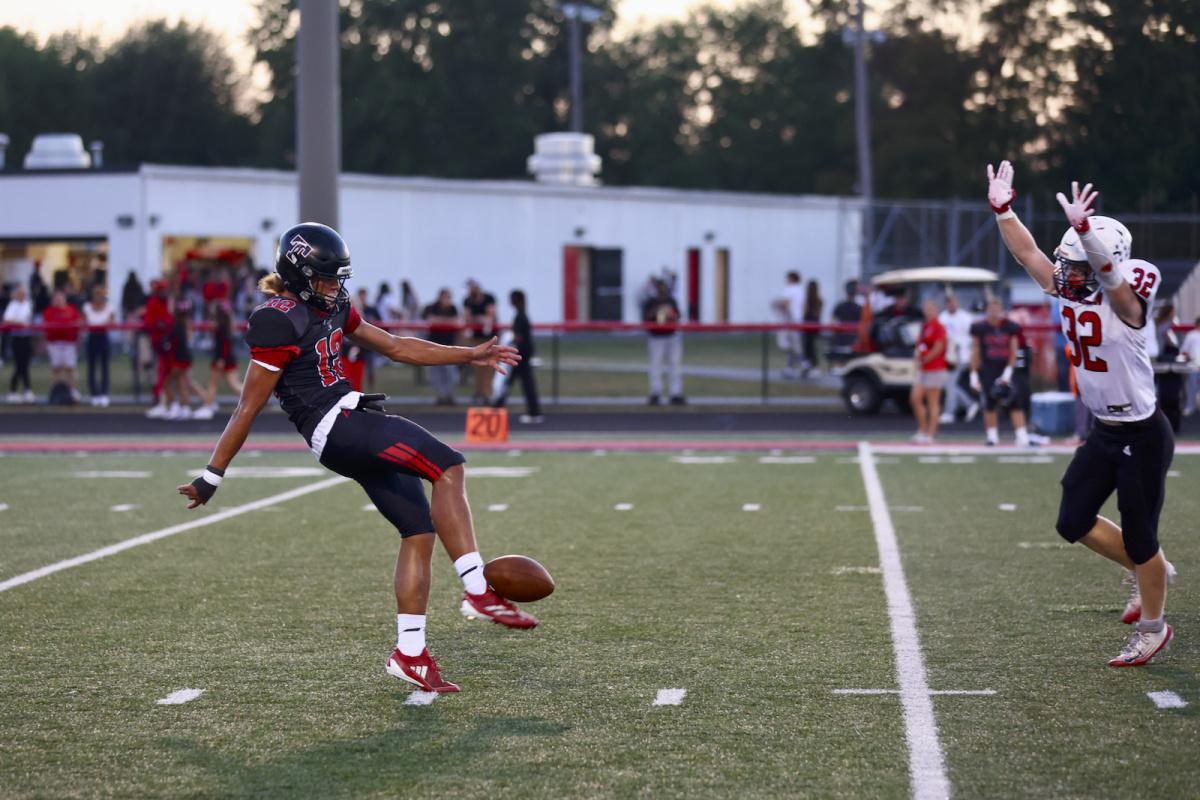 Harris leads Taylor to fifth win
