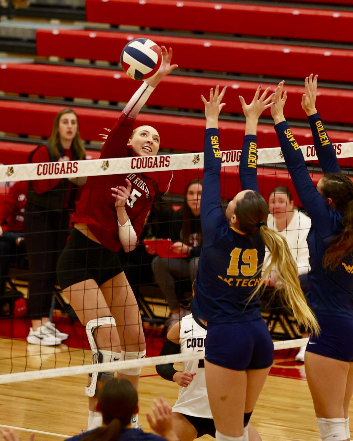 Cougars prowl to ninth conference title