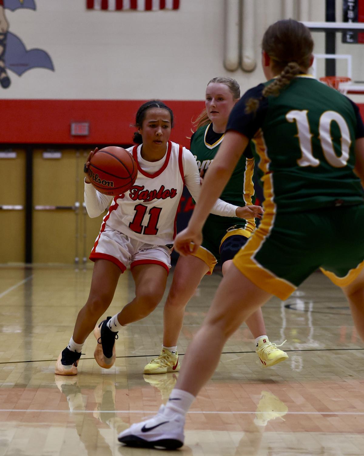 Taylor squeaks out a win