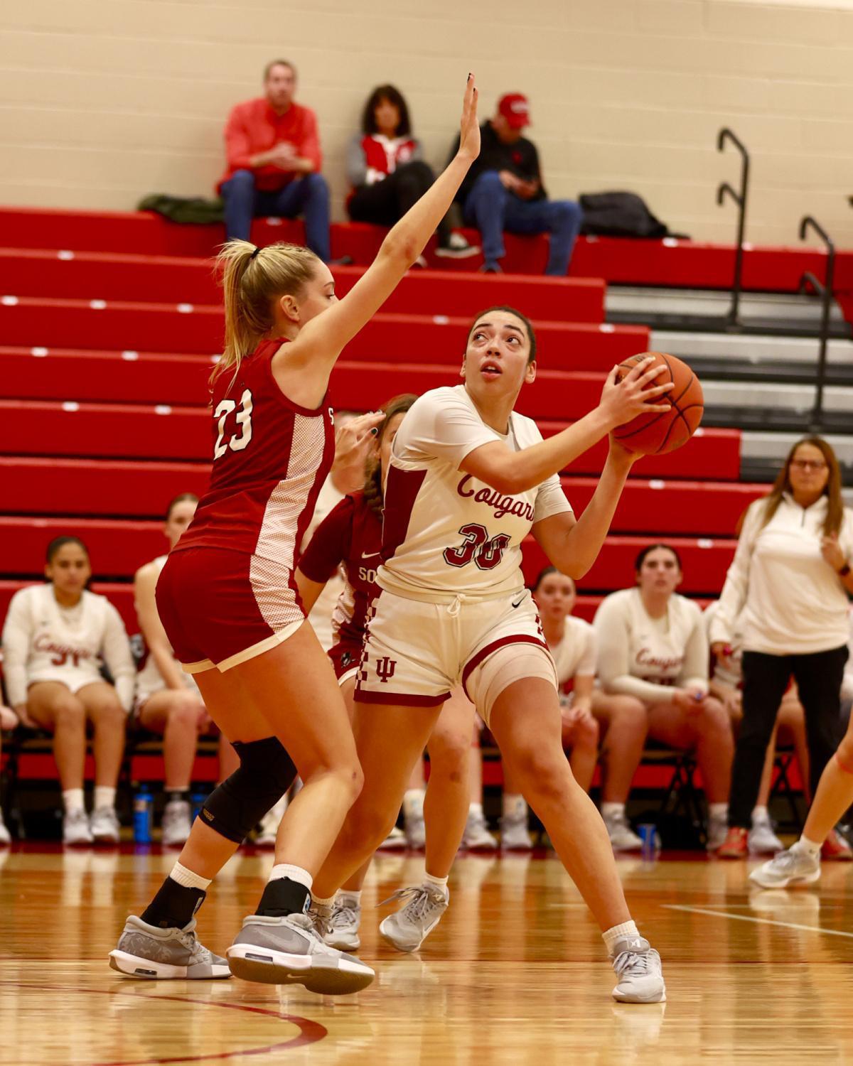 Cougars fall just short at home