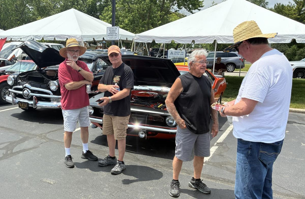 Solidarity car show survives the weather
