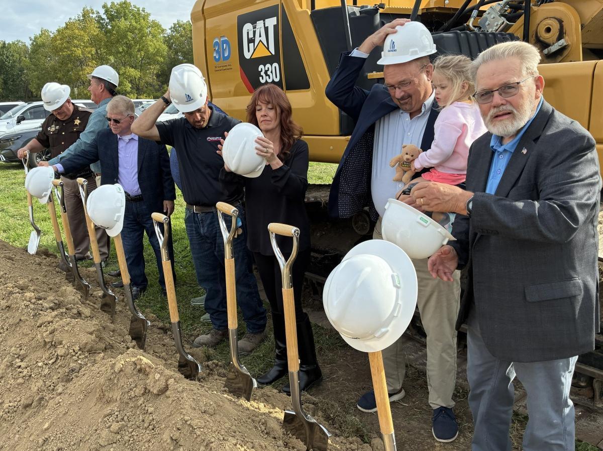 Turning shovels on a new jail