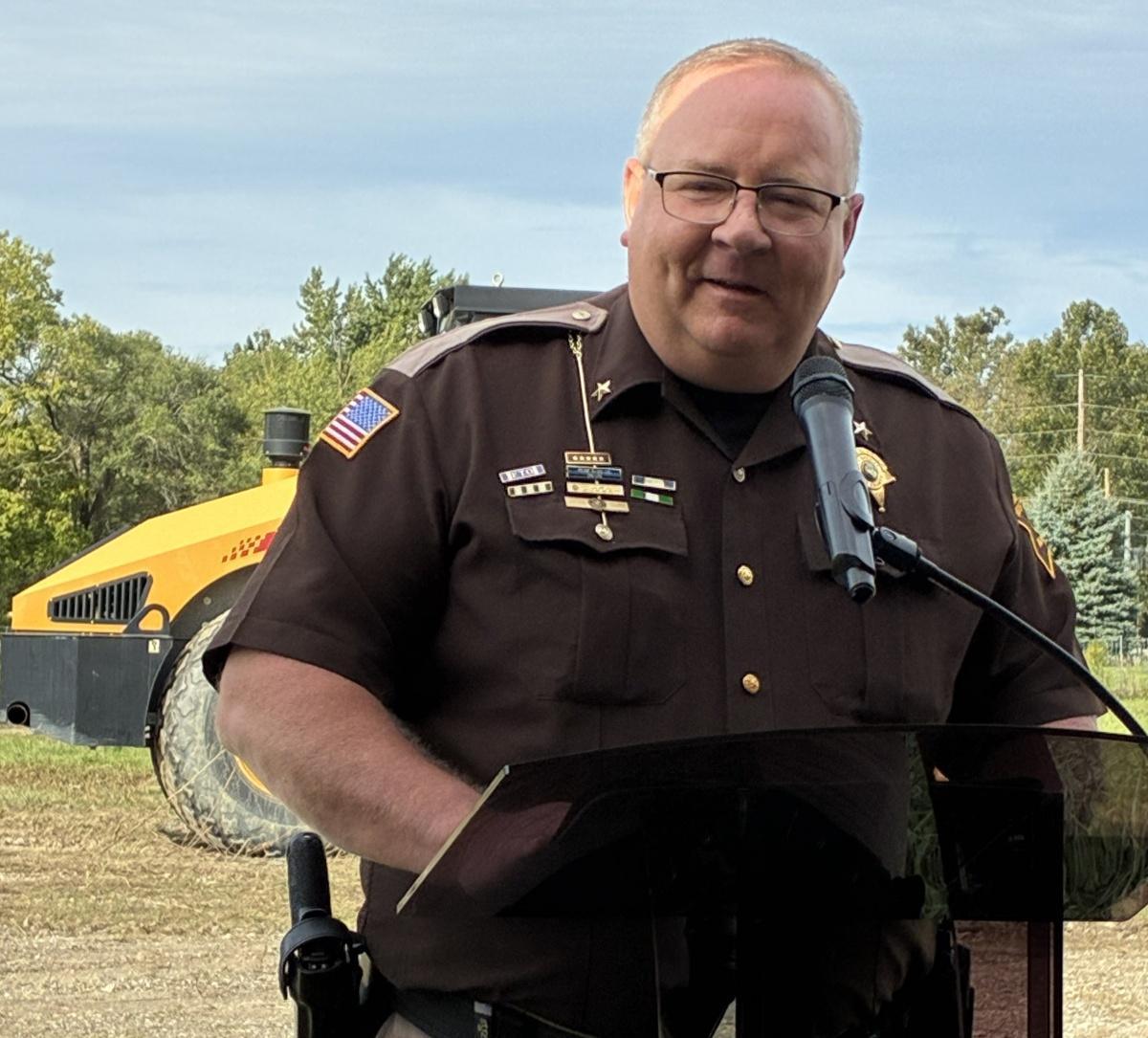 Turning shovels on a new jail